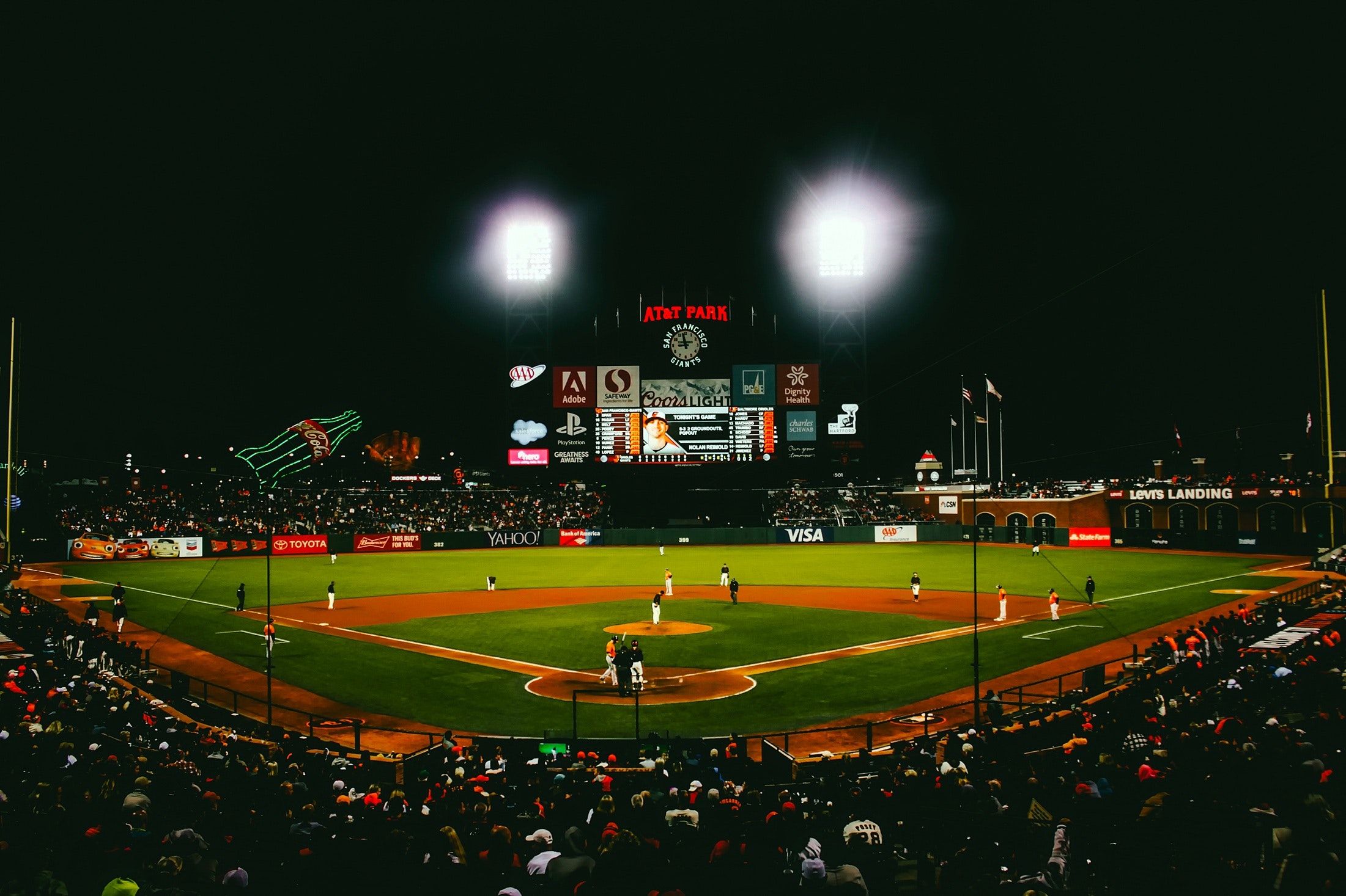 A baseball field with an active game