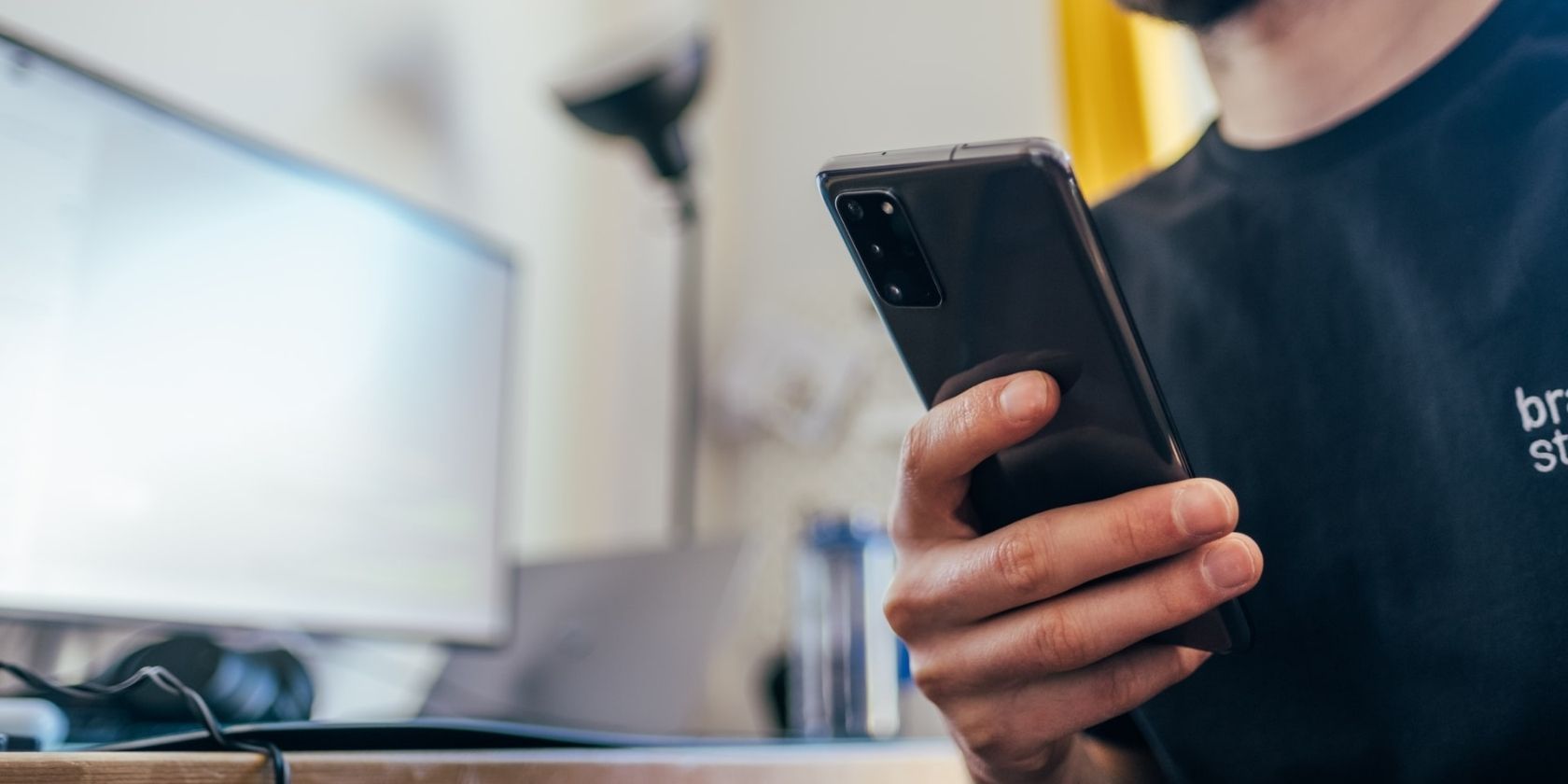 Man holding a Samsung Galaxy phone