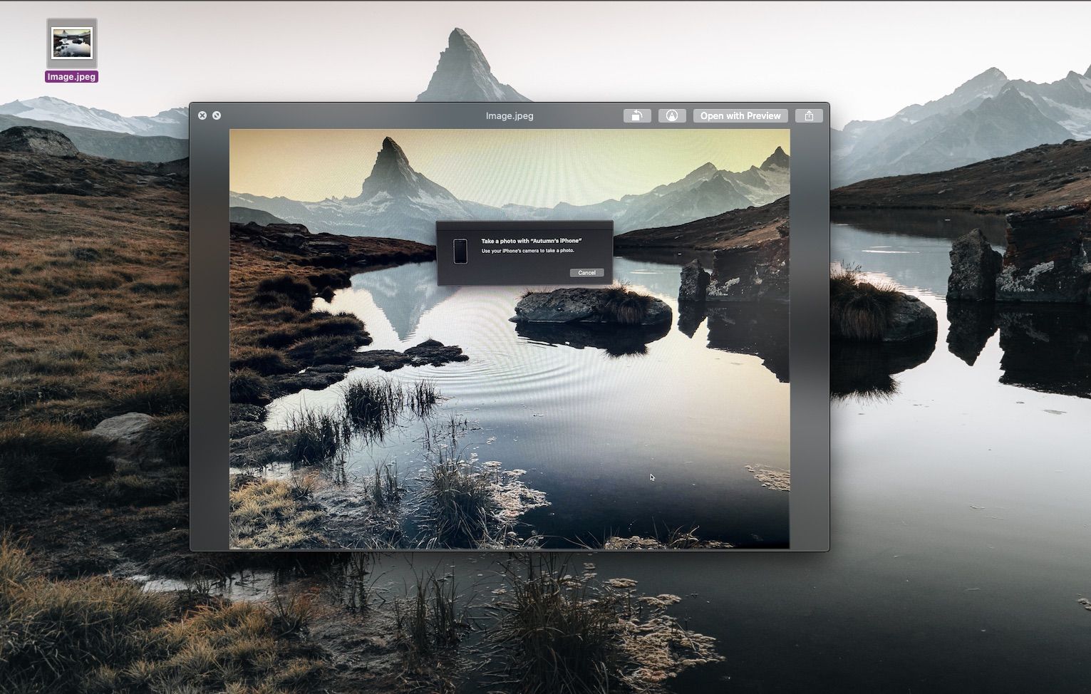 Photo files on a MacBook Pro desktop with Preview open