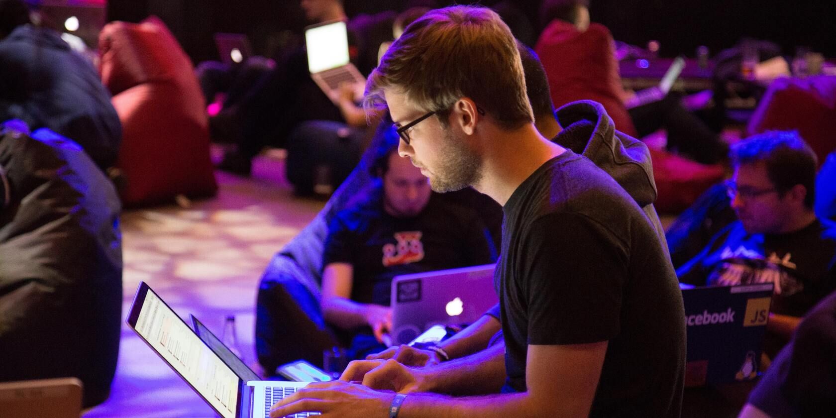 A purple team working in a room